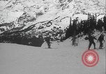 Image of Army ski troops descend mountain slopes Washington State United States USA, 1941, second 54 stock footage video 65675080943