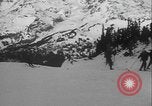 Image of Army ski troops descend mountain slopes Washington State United States USA, 1941, second 55 stock footage video 65675080943