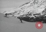 Image of Army ski troops descend mountain slopes Washington State United States USA, 1941, second 58 stock footage video 65675080943