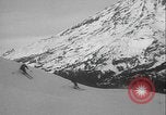 Image of Army ski troops descend mountain slopes Washington State United States USA, 1941, second 60 stock footage video 65675080943