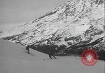 Image of Army ski troops descend mountain slopes Washington State United States USA, 1941, second 61 stock footage video 65675080943