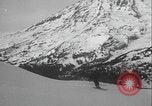 Image of Army ski troops descend mountain slopes Washington State United States USA, 1941, second 62 stock footage video 65675080943