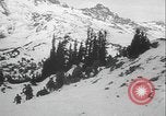 Image of US Army winter mountain skirmish drills Washington State United States USA, 1941, second 3 stock footage video 65675080944