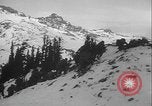 Image of US Army winter mountain skirmish drills Washington State United States USA, 1941, second 10 stock footage video 65675080944