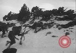 Image of US Army winter mountain skirmish drills Washington State United States USA, 1941, second 16 stock footage video 65675080944