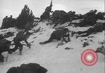 Image of US Army winter mountain skirmish drills Washington State United States USA, 1941, second 18 stock footage video 65675080944