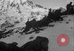 Image of US Army winter mountain skirmish drills Washington State United States USA, 1941, second 30 stock footage video 65675080944