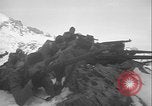Image of US Army winter mountain skirmish drills Washington State United States USA, 1941, second 42 stock footage video 65675080944