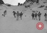 Image of US Army winter mountain skirmish drills Washington State United States USA, 1941, second 53 stock footage video 65675080944