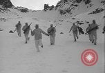 Image of US Army winter mountain skirmish drills Washington State United States USA, 1941, second 54 stock footage video 65675080944