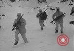 Image of US Army winter mountain skirmish drills Washington State United States USA, 1941, second 56 stock footage video 65675080944