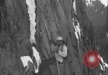 Image of US Army rappelling exercise Washington State United States USA, 1941, second 29 stock footage video 65675080946