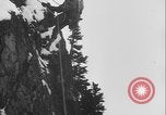 Image of US Army rappelling exercise Washington State United States USA, 1941, second 34 stock footage video 65675080946
