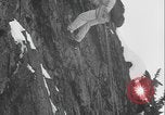 Image of US Army rappelling exercise Washington State United States USA, 1941, second 42 stock footage video 65675080946
