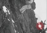 Image of US Army rappelling exercise Washington State United States USA, 1941, second 43 stock footage video 65675080946