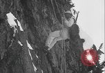 Image of US Army rappelling exercise Washington State United States USA, 1941, second 46 stock footage video 65675080946