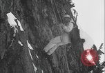 Image of US Army rappelling exercise Washington State United States USA, 1941, second 47 stock footage video 65675080946