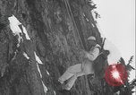 Image of US Army rappelling exercise Washington State United States USA, 1941, second 49 stock footage video 65675080946