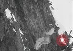 Image of US Army rappelling exercise Washington State United States USA, 1941, second 50 stock footage video 65675080946
