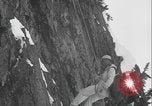 Image of US Army rappelling exercise Washington State United States USA, 1941, second 51 stock footage video 65675080946