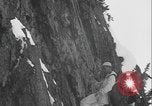 Image of US Army rappelling exercise Washington State United States USA, 1941, second 52 stock footage video 65675080946