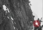 Image of US Army rappelling exercise Washington State United States USA, 1941, second 53 stock footage video 65675080946