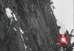 Image of US Army rappelling exercise Washington State United States USA, 1941, second 54 stock footage video 65675080946