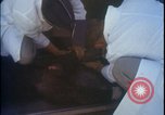 Image of chimpanzee rocket sled testing preparations New Mexico United States USA, 1960, second 55 stock footage video 65675080960
