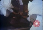 Image of chimpanzee rocket sled testing preparations New Mexico United States USA, 1960, second 56 stock footage video 65675080960