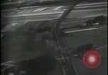 Image of aircraft strafing train and building Europe, 1877, second 8 stock footage video 65675080966