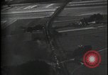 Image of aircraft strafing train and building Europe, 1877, second 9 stock footage video 65675080966