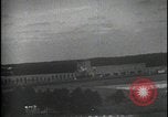Image of aircraft strafing train and building Europe, 1877, second 37 stock footage video 65675080966