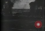Image of aircraft strafing train and building Europe, 1877, second 43 stock footage video 65675080966