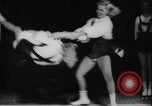 Image of roller skating acrobatics performance Germany, 1940, second 9 stock footage video 65675080993