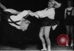 Image of roller skating acrobatics performance Germany, 1940, second 10 stock footage video 65675080993