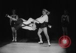 Image of roller skating acrobatics performance Germany, 1940, second 12 stock footage video 65675080993
