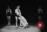 Image of roller skating acrobatics performance Germany, 1940, second 13 stock footage video 65675080993