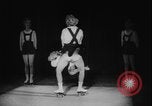 Image of roller skating acrobatics performance Germany, 1940, second 14 stock footage video 65675080993