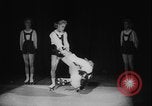 Image of roller skating acrobatics performance Germany, 1940, second 16 stock footage video 65675080993