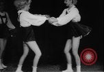 Image of roller skating acrobatics performance Germany, 1940, second 23 stock footage video 65675080993