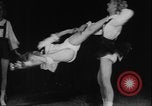 Image of roller skating acrobatics performance Germany, 1940, second 29 stock footage video 65675080993