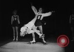 Image of roller skating acrobatics performance Germany, 1940, second 36 stock footage video 65675080993