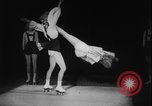 Image of roller skating acrobatics performance Germany, 1940, second 37 stock footage video 65675080993