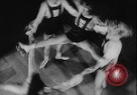 Image of roller skating acrobatics performance Germany, 1940, second 60 stock footage video 65675080993